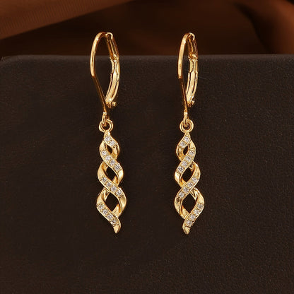 Schimmer Drehung Ava Ohrringe | Gold